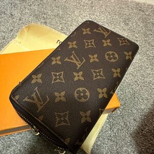 Brown double wallet with zippers